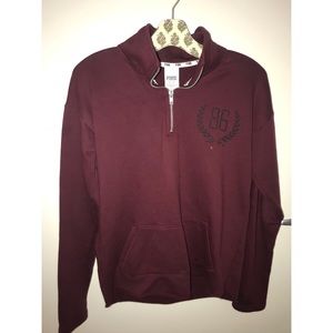 Pink quarter zip, white dot in photo not on item